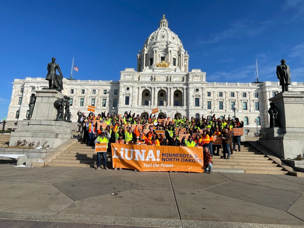 LIUNA members rally on Minnesota State Capitol steps with signs